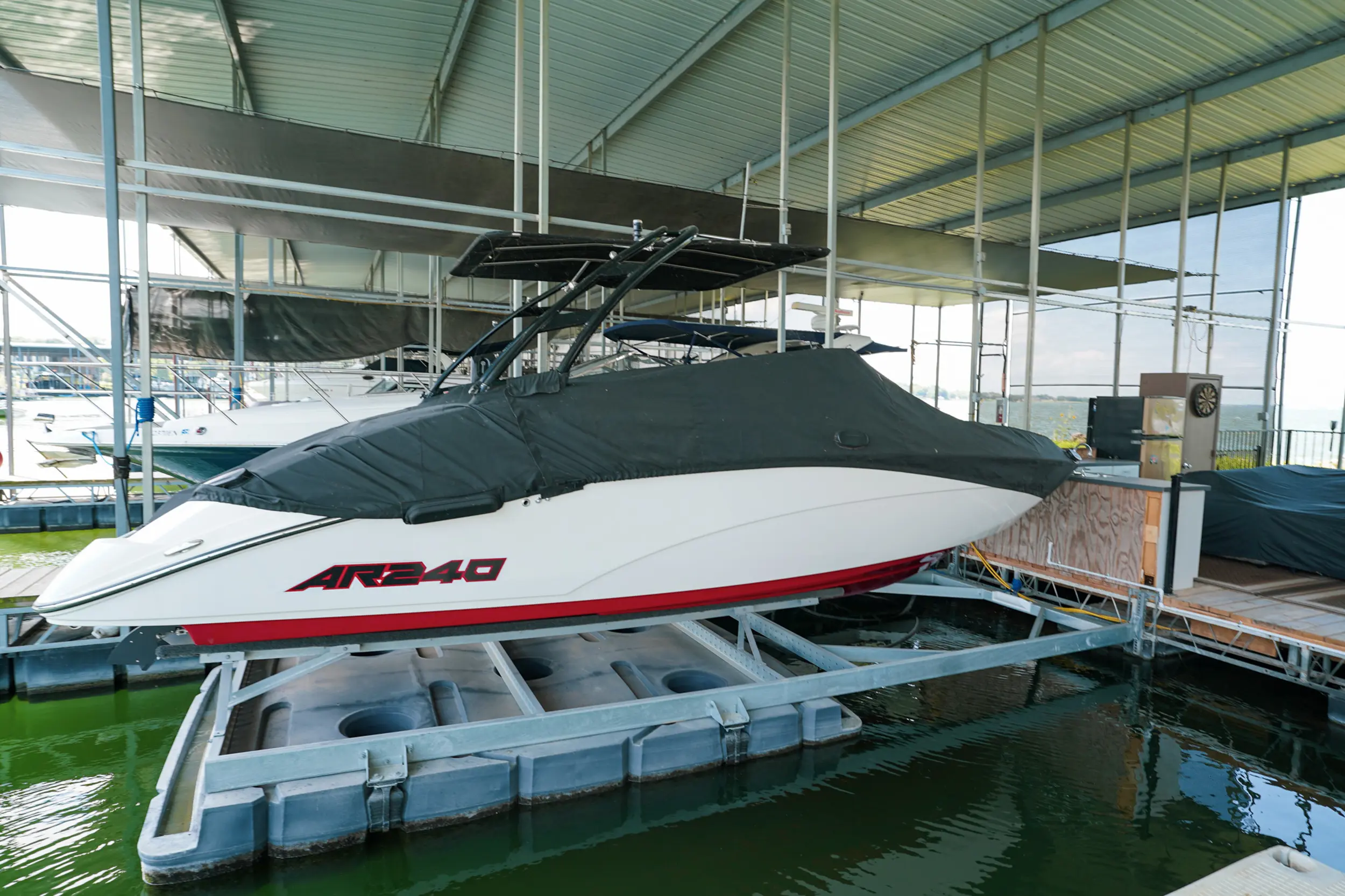 Personal watercraft dock and HydroHoist waterfront system